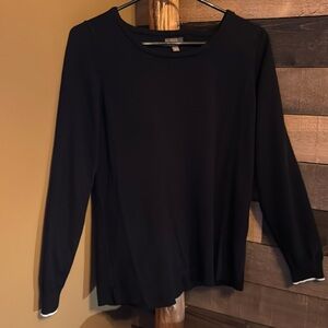 Black dress sweater trimmed with white.